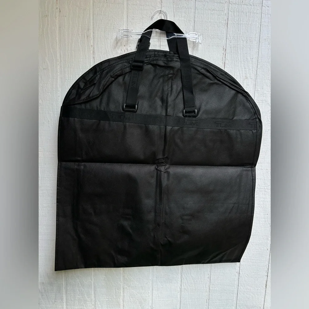 Tumi Travel Garment Bag black suits and dresses, during travel NEW 52” long 23”